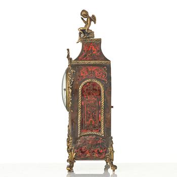 A Rococo-style mantle clock, around 1900.