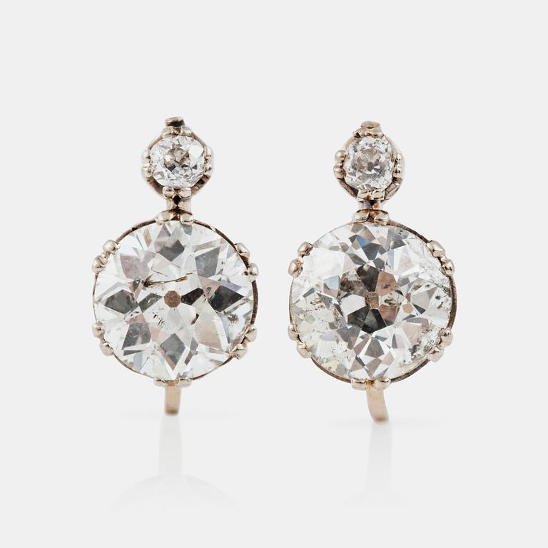 A pair of old-cut diamond, circa 5.00 cts in total, circa I-J/I1, earrings.
