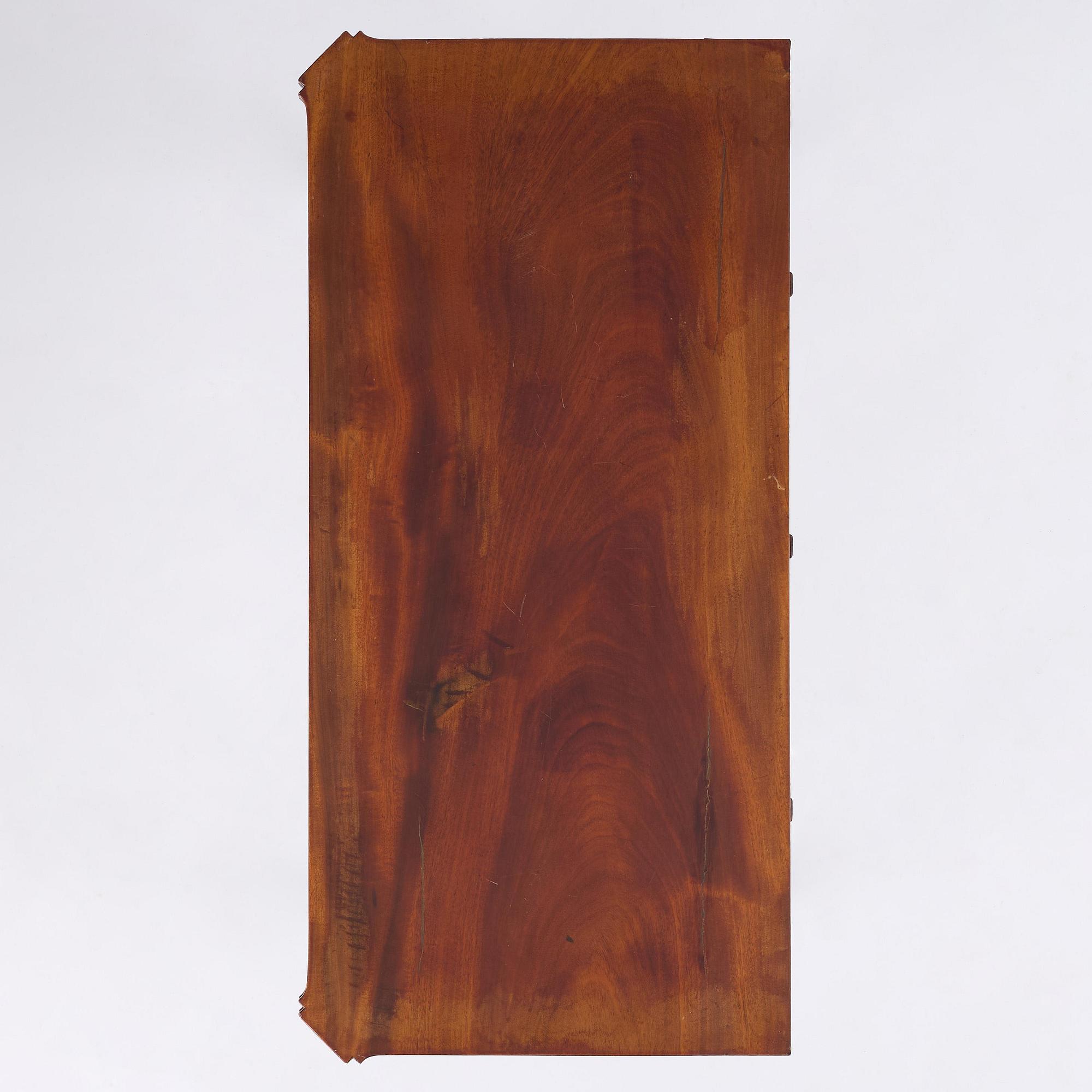 A Gustavian 'concertina action' mahogany games table by Georg Haupt (master in Stockholm 1770-84).