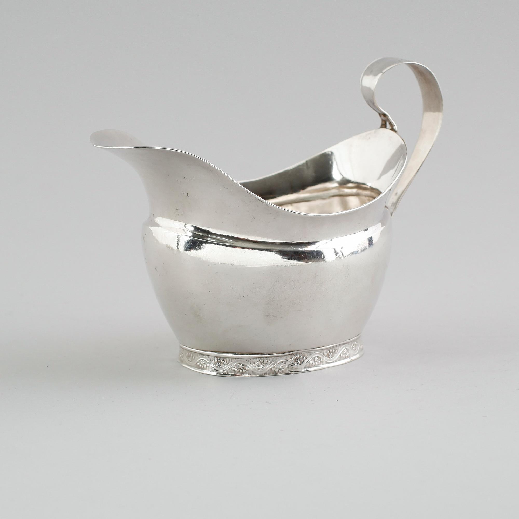 GRÄDDKANNA, silver, Anders Emanuel Blomqvist, Vadstena 1827. Vikt ca 143 gram.