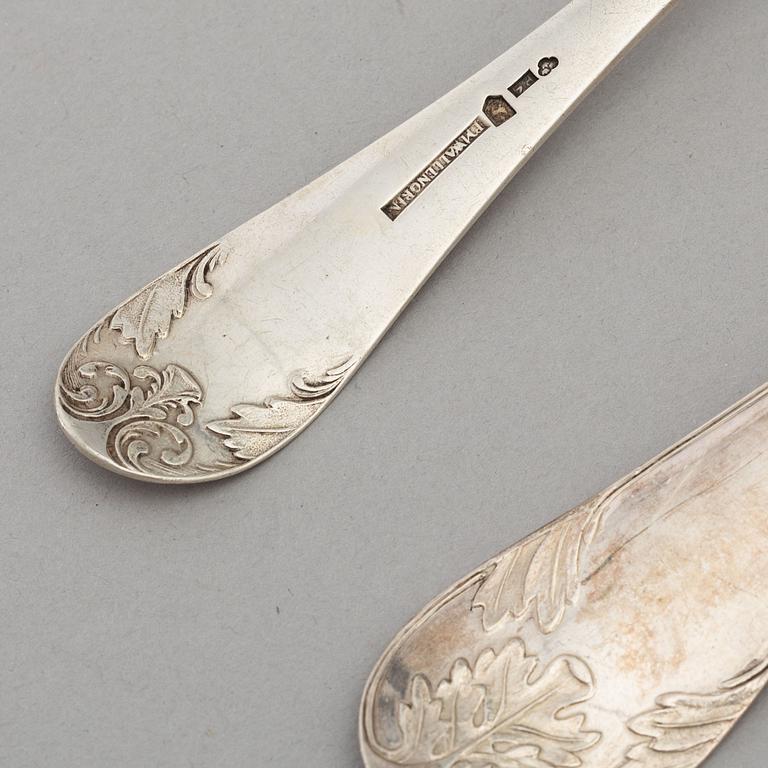 A set of eight silver spoons and a serving spoon, incl with the mark of PM Wallengren 1845.