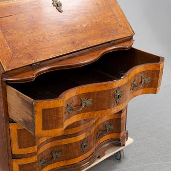 A late baroque secretaire chest of drawers, 18th century, northen Germany.