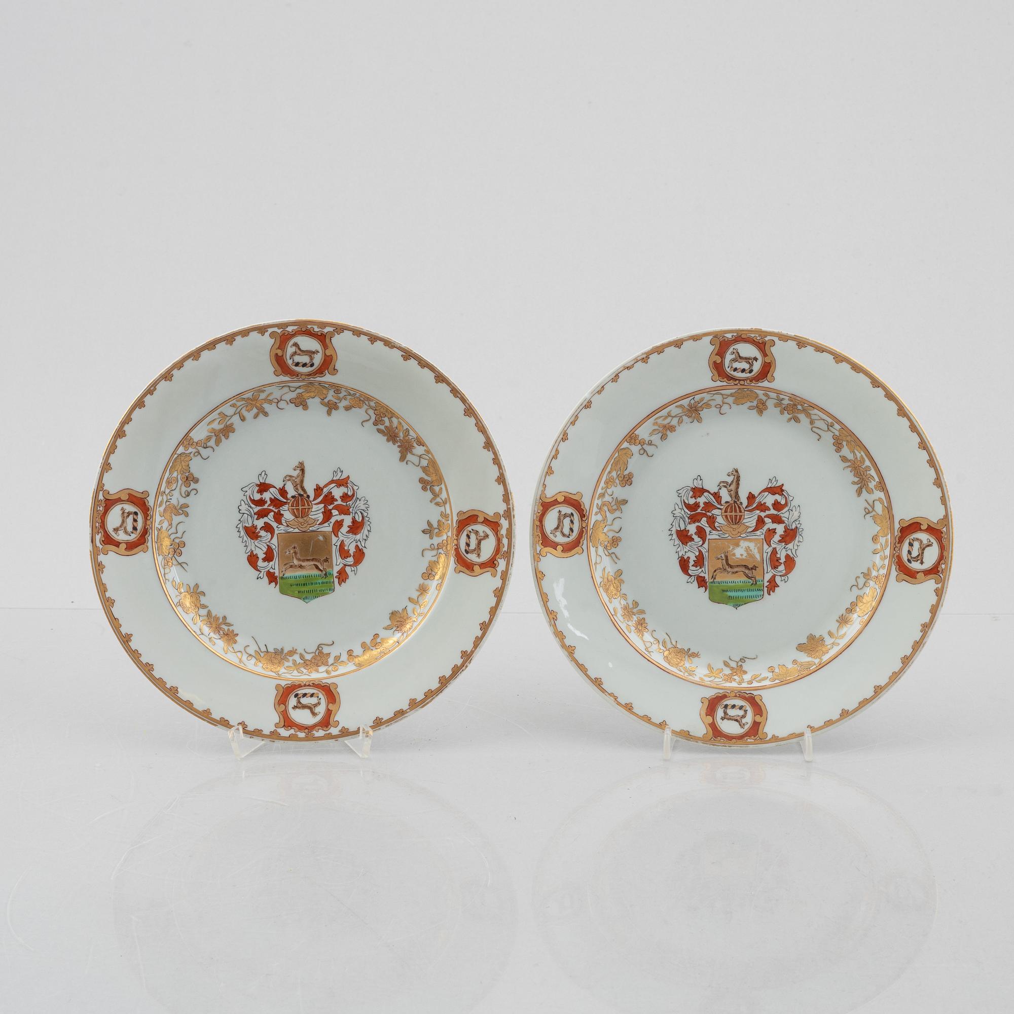 A group of nine porcelain armorial plates, probablu Samson, 19th/20th century.