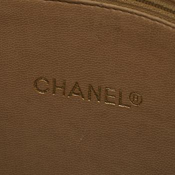 Chanel, a beige leather handbag, 1986-1988.