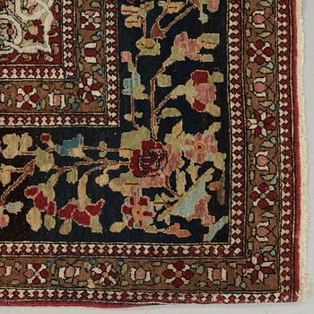 A RUG. An antique Esfahan. 212 x 141 cm.