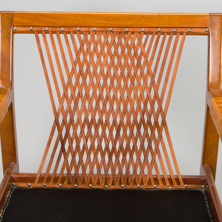 Carl Gustaf Hiort af Ornäs, a pair of late 1950s 'Rialto' open armchairs, Puunveisto Oy - Träsnideri Ab, Finland.