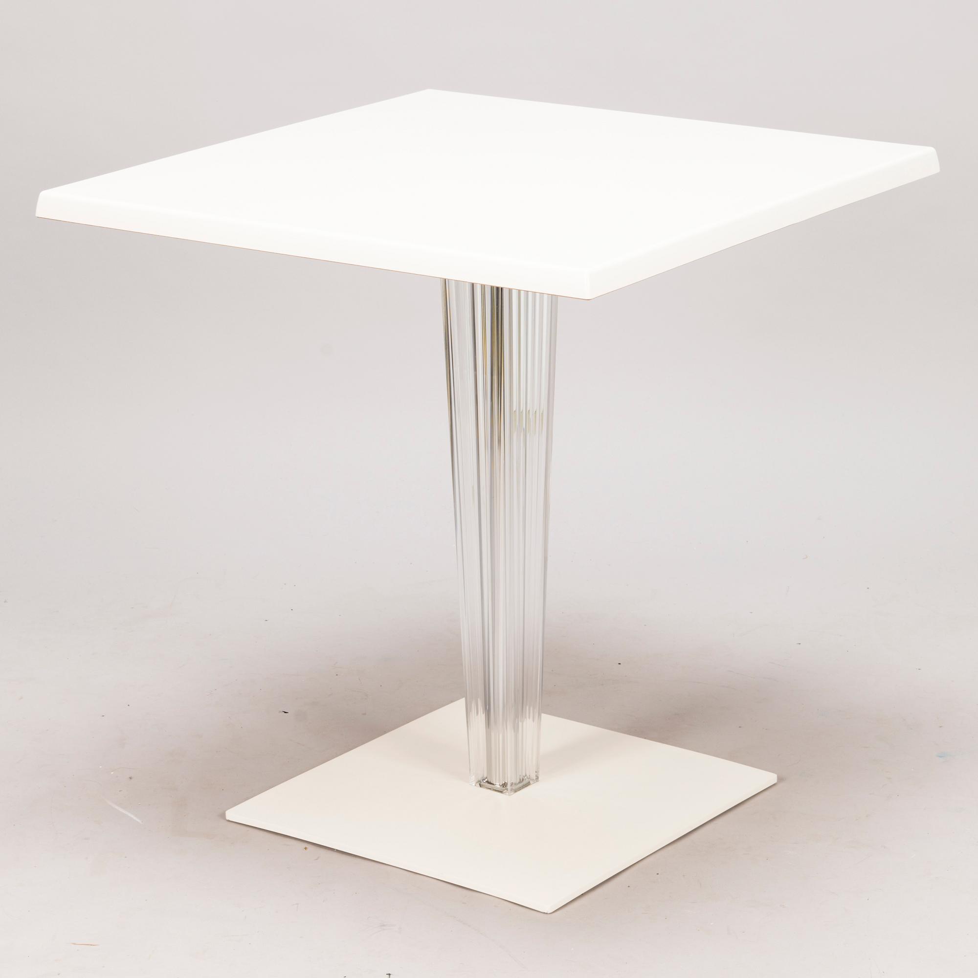 A 'Top Top' Table designed by Philippe Starck with Eugeni Quitllet for Kartell, Italy.