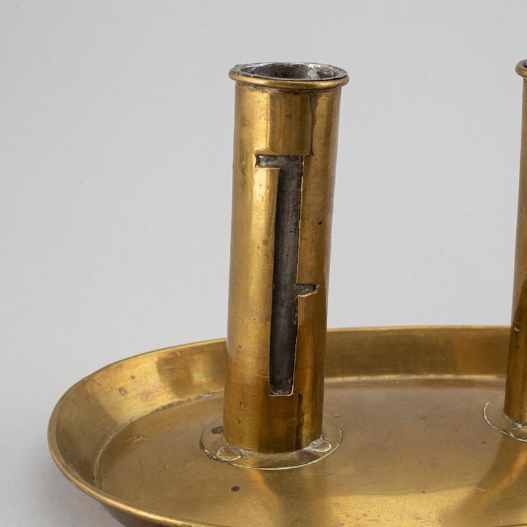 A pair of North European Brass double candelholders, 19th century.