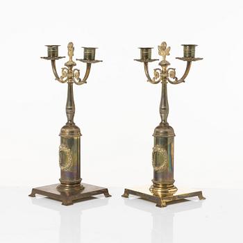 Candle holders, a pair of brass, Empire style, 20th century.