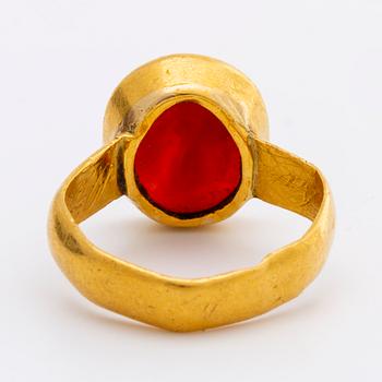 A signet carnelian ring.