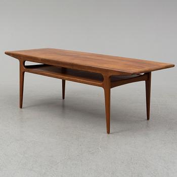 A 1960s teak coffee table.
