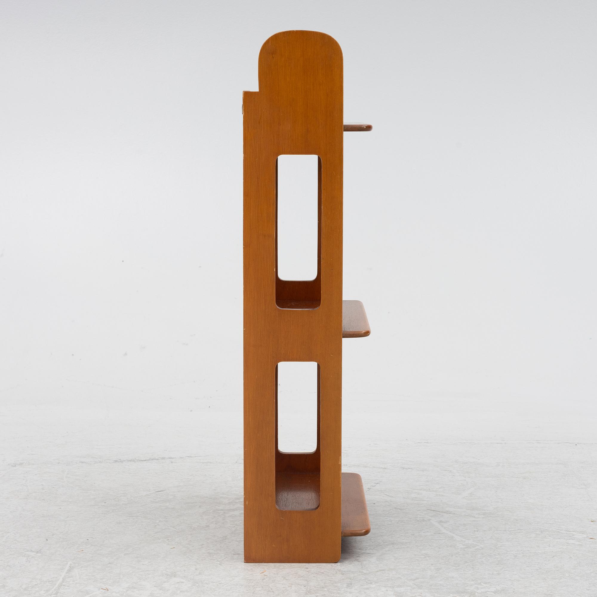 Josef Frank, a model B 2085 wall shelf for Firma Svenskt Tenn.