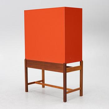 Josef Frank, a red lacquered cabinet, model 2192, 'The Cardboard Cabinet' by Svenskt Tenn, after 1985.