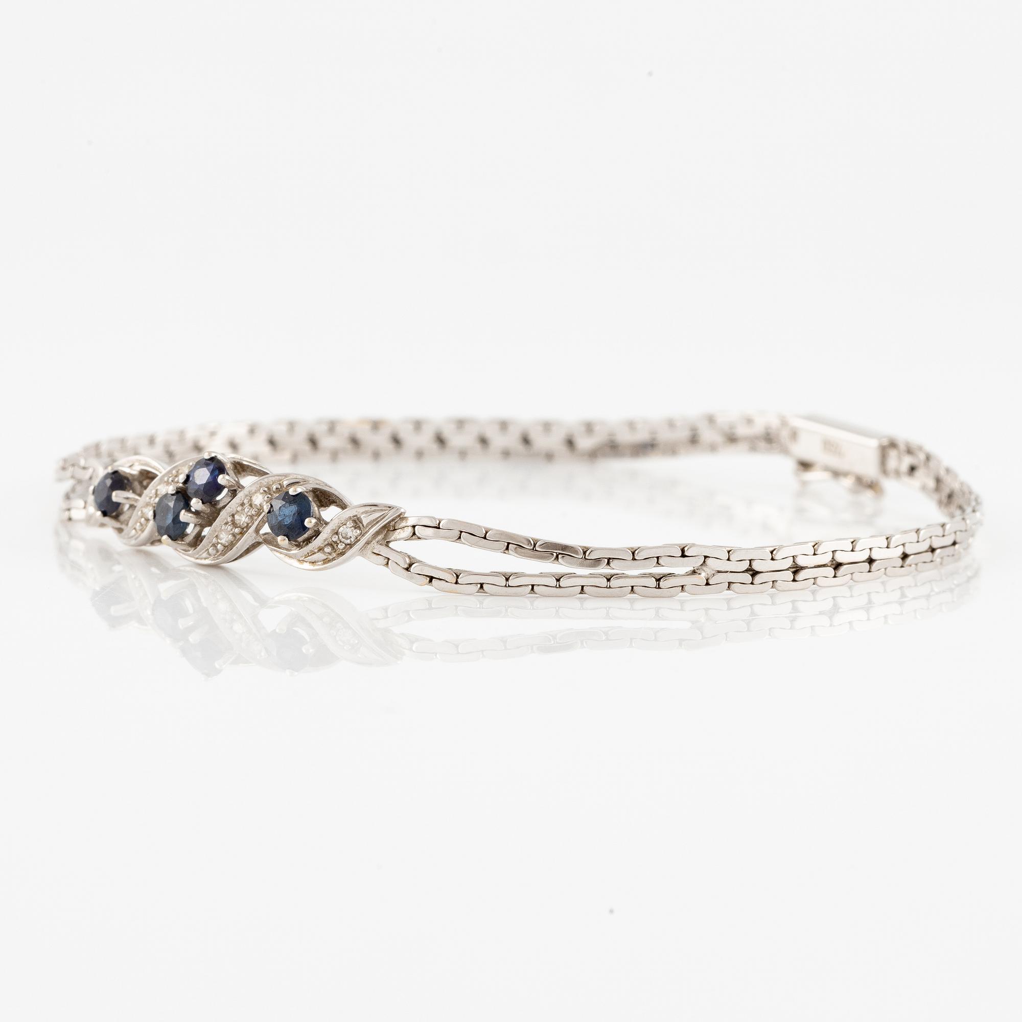 Arm bracelet, 18K white gold with small octagon-cut diamonds and sapphires.
