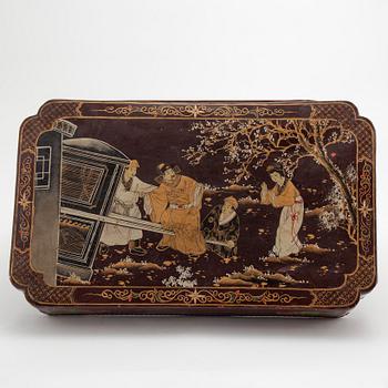 A painted Japanese four tiered box, 20th Century.