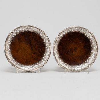 A pair of sterling silver coasters, late 20th Centrury.