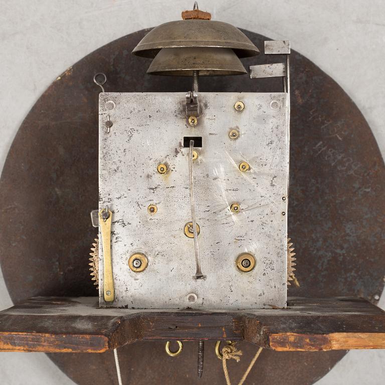 a painted grandfather-clock from the first half of the 19th century.