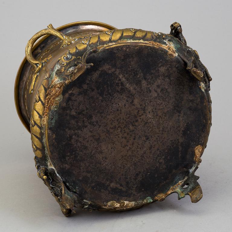 A LATE 19TH CENTURY BRASS CHAMPAGNE COOLER.