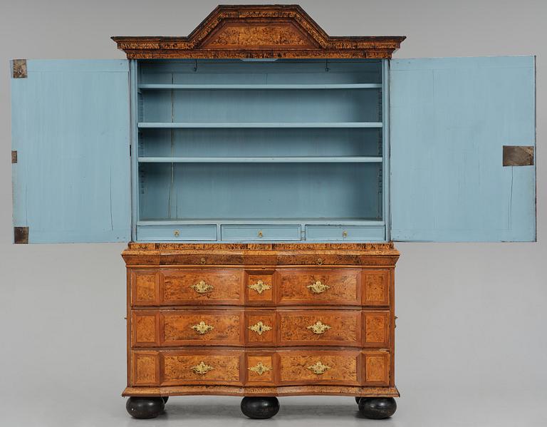 A Swedish late baroque burr-alder cabinet, first part 18th century.