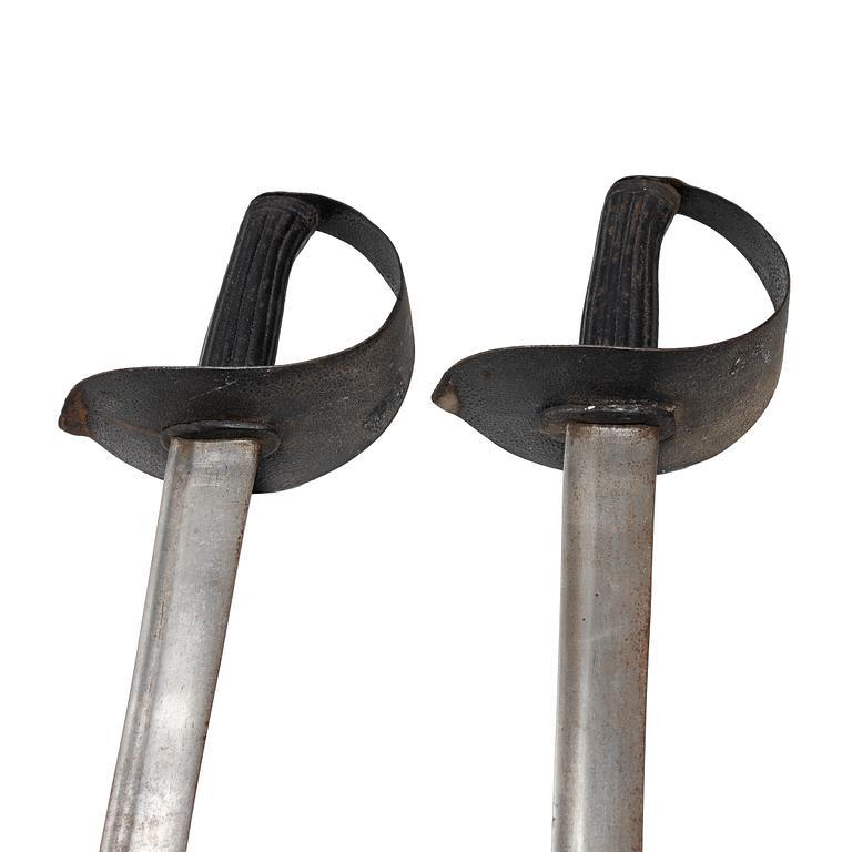 Two 19th century naval cutlasses.