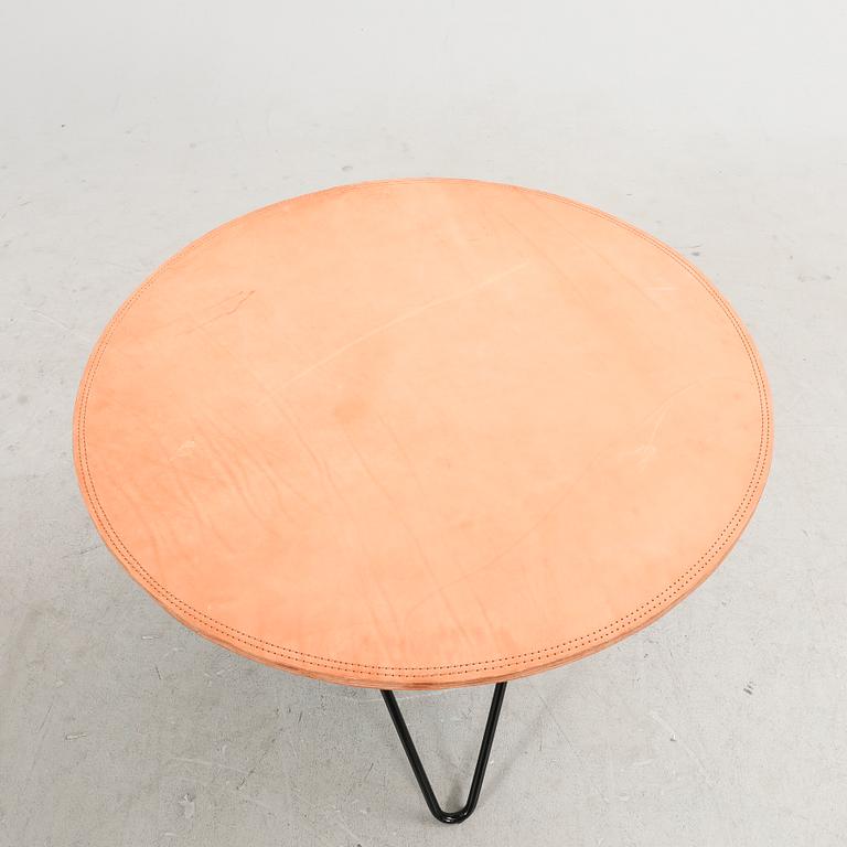 A 2022 leather top table 'O table' by Dennis Marquat for OX Denmarq.