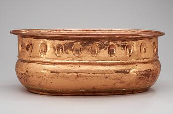 286. A baroque style copper wine cooler.