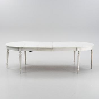 A painted dining table, 20th Century with older parts.