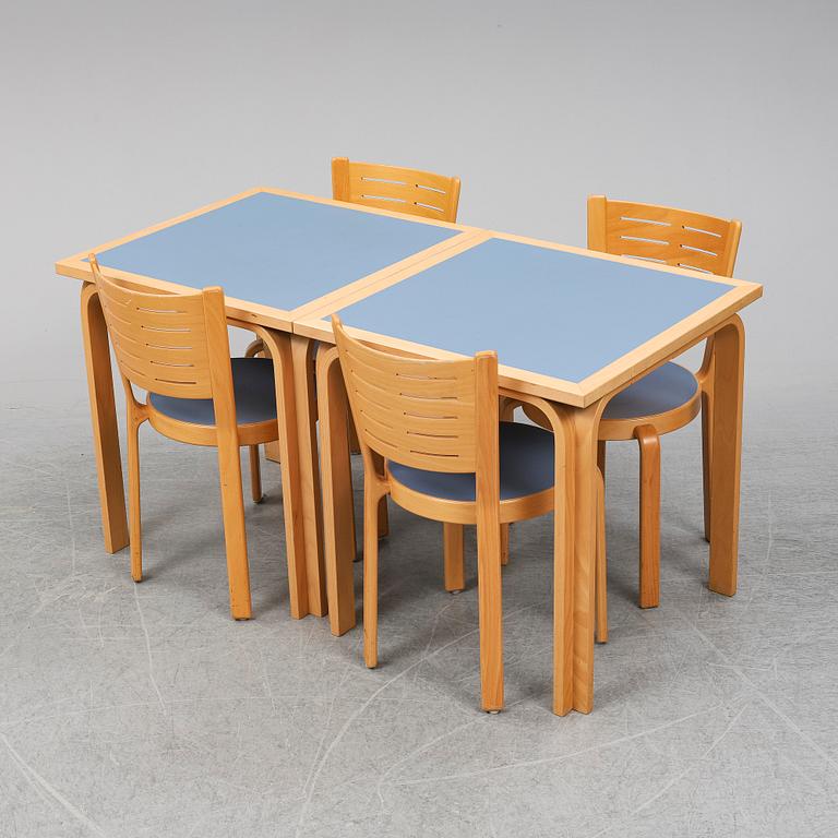 Table with four chairs, late 20th Century by Magnus Olesen.