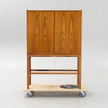 A mid 20th century bar cabinet.