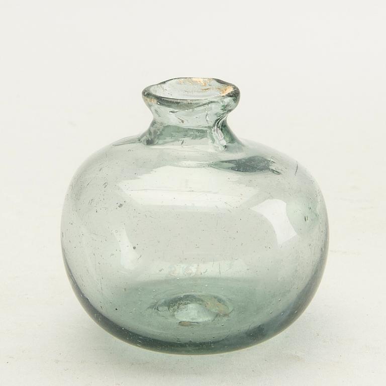 A group of five persian glass bottles and a ball, 19th/20th Century.