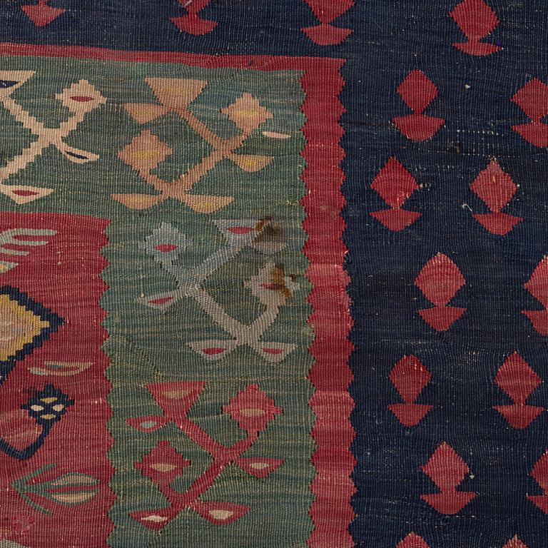 An antique Sarköy kelim, ca 239 x 214 cm.
