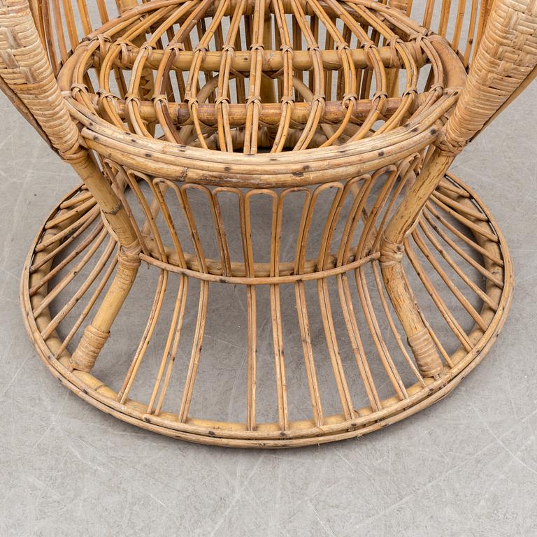 a rattan chair by Gio Ponti & Lio Carminati, Italy, second half of the 20th century.