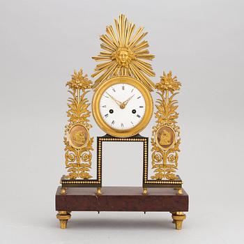 An Empire mantle clock, first half of the 19th Century.