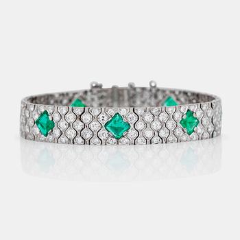 681. An emerald and brilliant-cut diamond bracelet, signed Cartier. Total carat weight of diamonds ca 5.70 cts. No 58436.