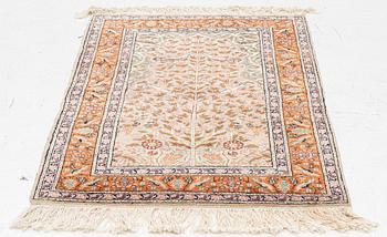 An oriental rug, c. 135 x 85 cm.