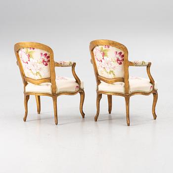 A pair of presumably French Louis XV armchairs, mid 18th century.