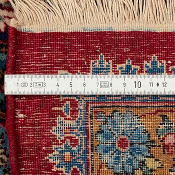 A semi-antique Kerman carpet, ca 431 x 312,5 cm.