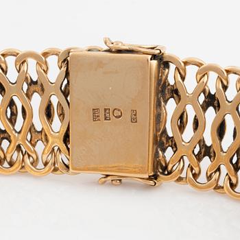An 18K gold bracelet by CF Carlman.