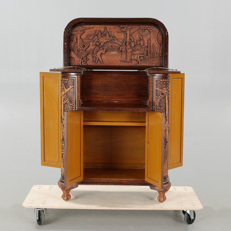 An oriental coctail cabinet, from the second half of the 20th century.