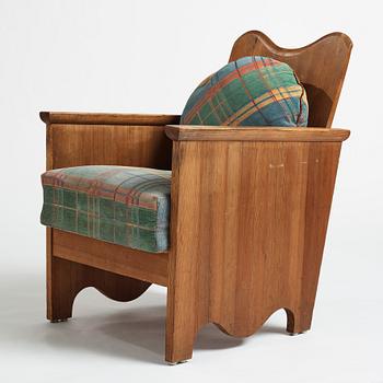 Axel Einar Hjorth, a stained pine easy chair "Utö", Nordiska Kompaniet, Sweden 1930's.