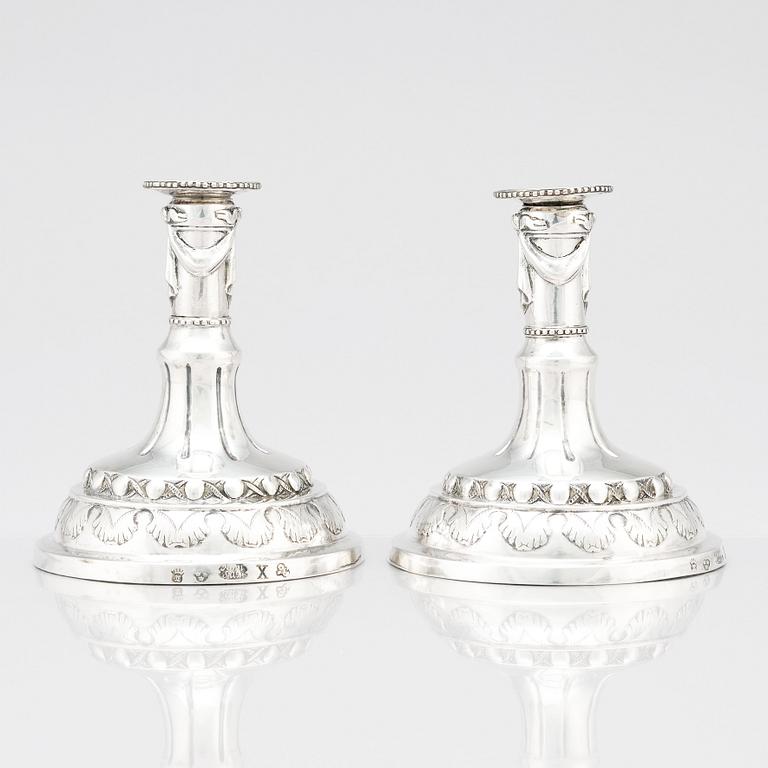 A pair of Swedish silver candlesticks, marks of Sigismund Novisadi the younger, Karlskrona 1780.