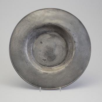 A PEWTER PLATE, dated 1693.