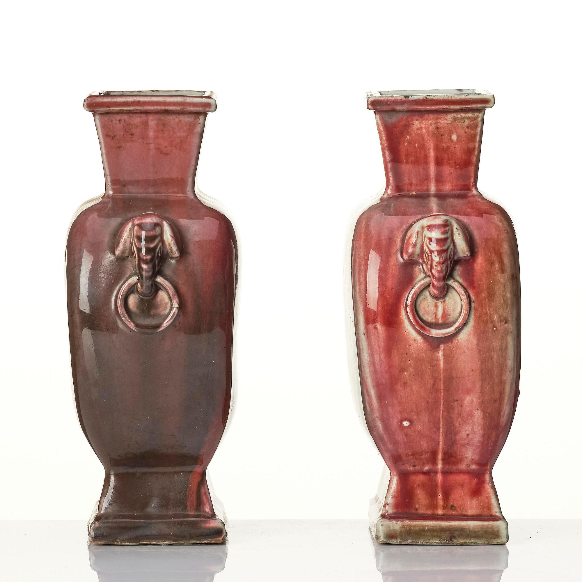 A pair of red glazed vases, Qing dynasty 18th/19th century.