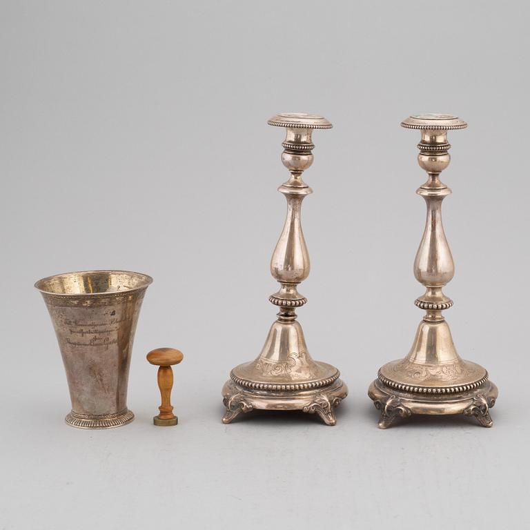 Four items with a royal provenance. Silver candlesticks, silver beaker, brass seal and a telegram.