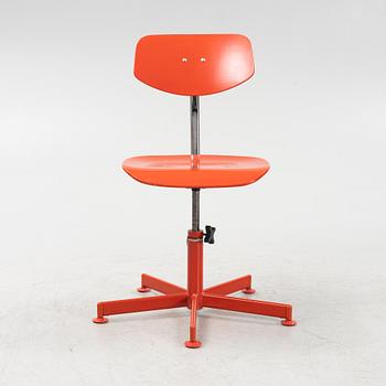 A red desk chair, 1970's.
