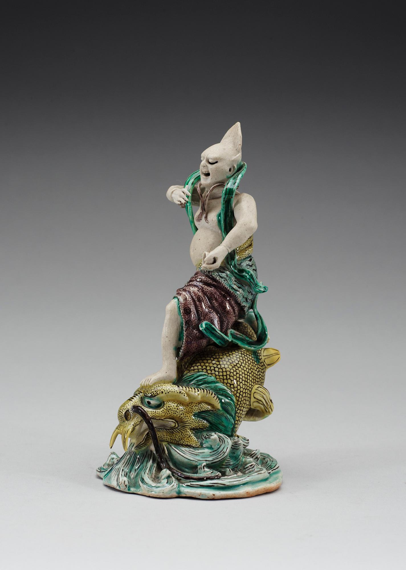 A famille verte figurine of a sea deamon, Qing dynasty, Kangxi (1662-1722).