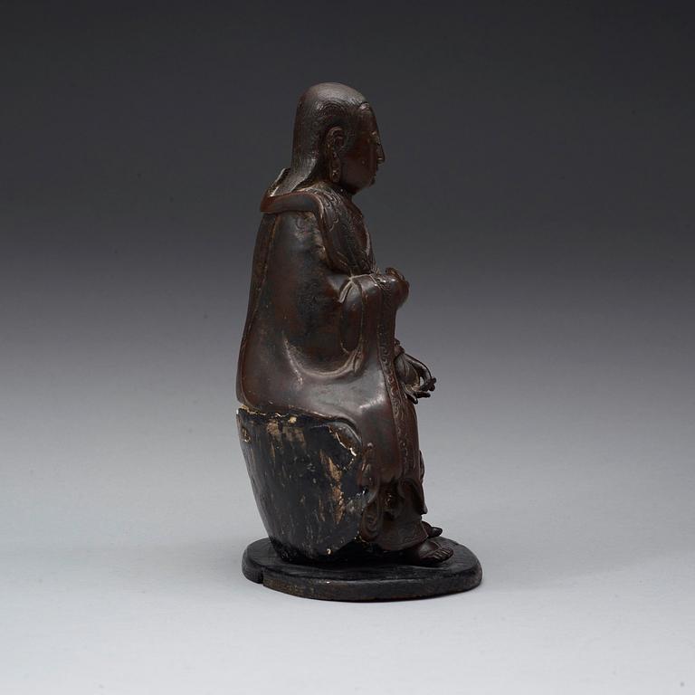 A bronze figure of a daoistic deity, 17th century.