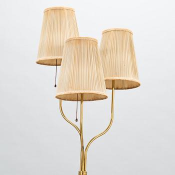 A mid-20th century floor lamp.