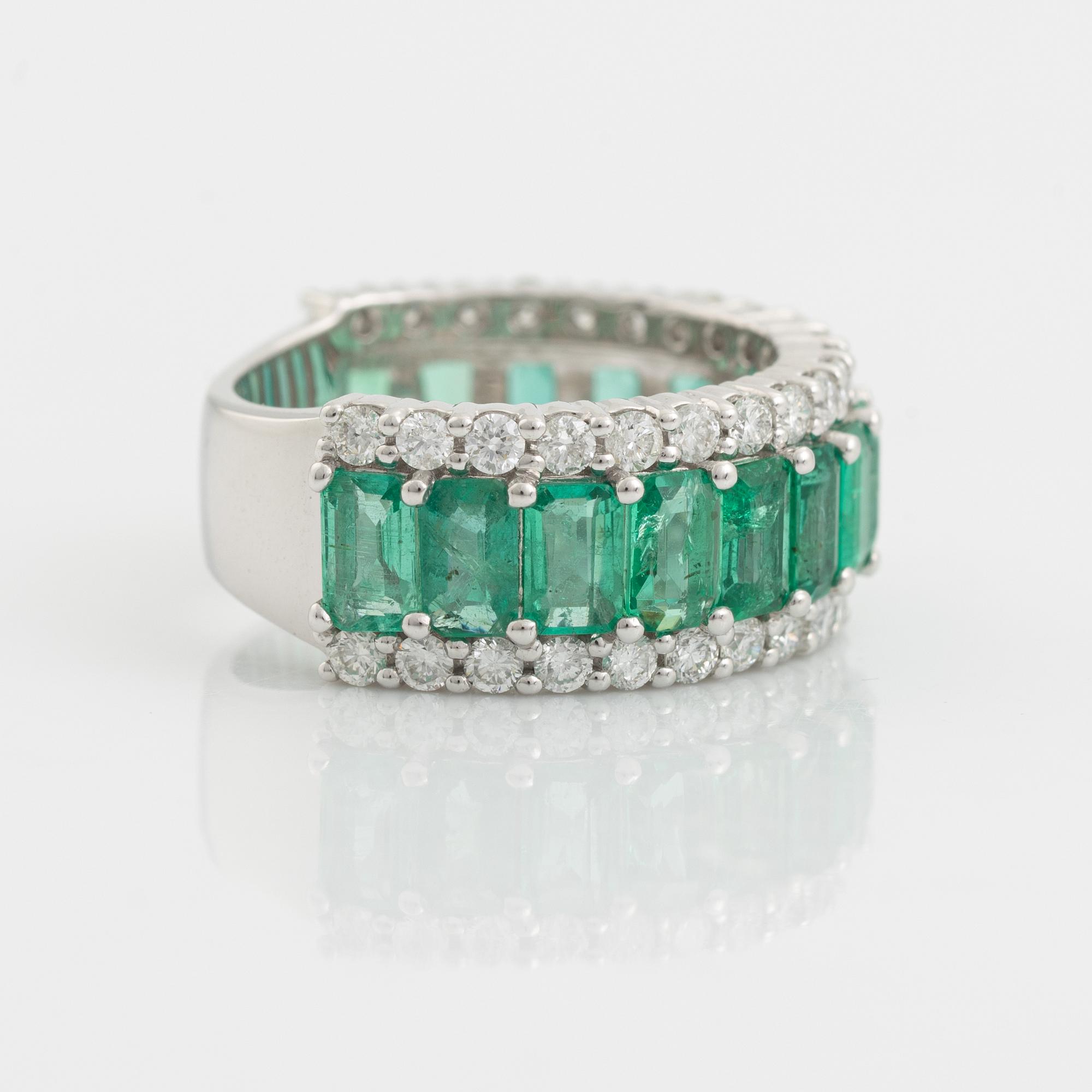 Emerald and brilliant cut diamond ring.