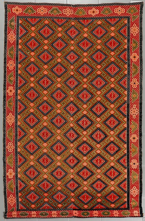 A wall textile, signed, around the year 1900, 208 x 130 cm.